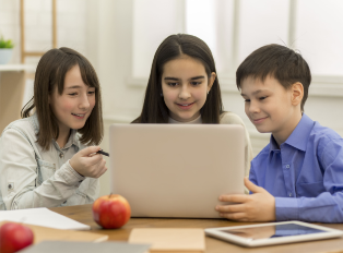 school-girls-and-boy-playing-on-laptop-in-school-D4YBH2W-1.png